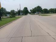 10th St east of IA HWY 150 (W)